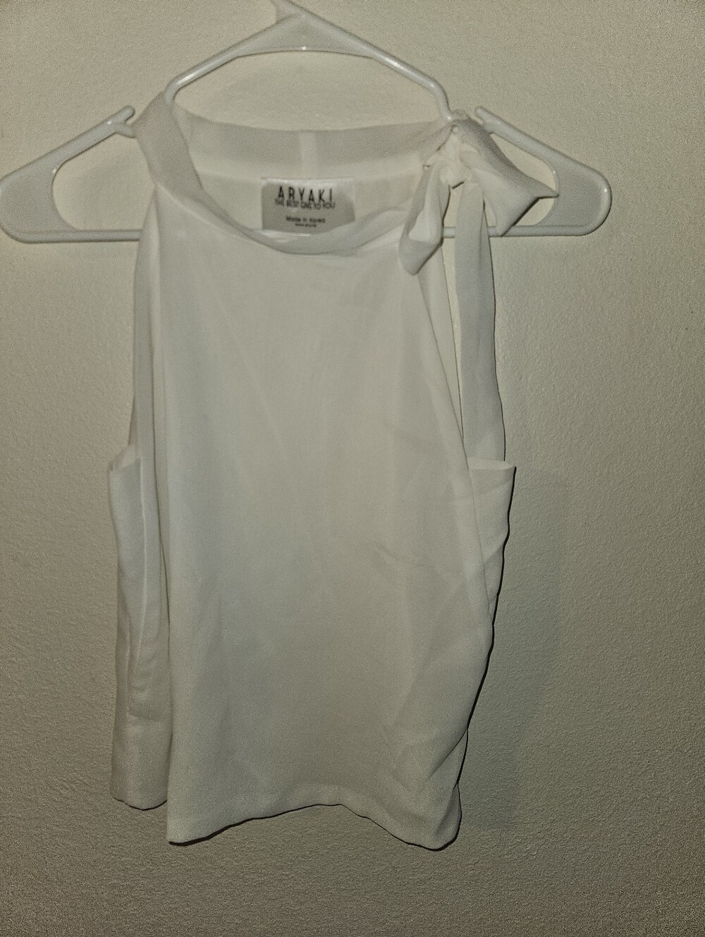 Aryaki Womans White Sleeveless Blouse